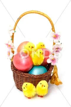 Basket with easter eggs Stock Photos