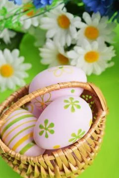 Basket of easter eggs Stock Photos