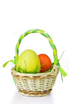 Basket with easter eggs Stock Photos