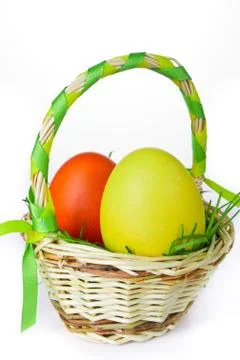 Basket with easter eggs Stock Photos