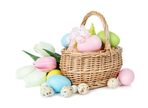 Basket with Easter eggs Stock Photos