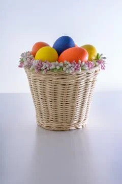 Basket with easter-eggs Stock Photos