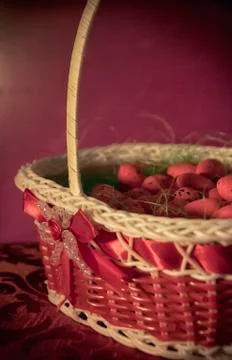 A Basket with Easter Eggs Stock Photos