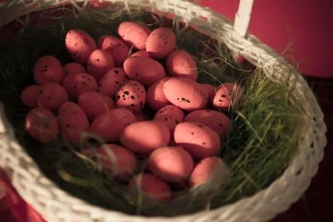A Basket with Easter Eggs Stock Photos