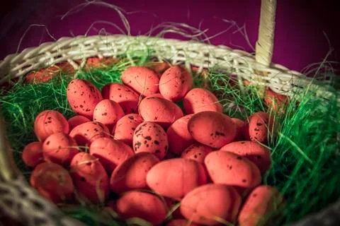 A Basket with Easter Eggs Stock Photos