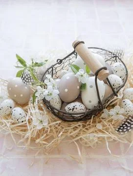 A basket with Easter eggs Stock Photos