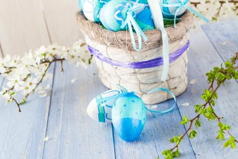 Basket Easter eggs spring branches Stock Photos