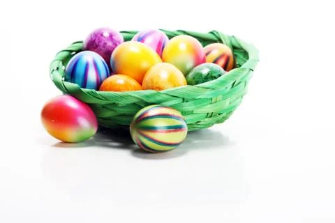 Basket of Easter eggs on table. easter decoration Stock Photos