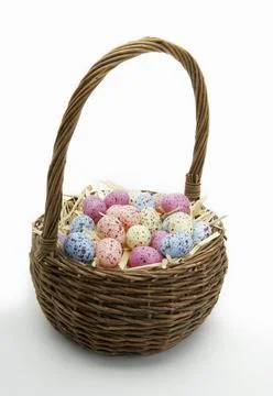 Basket of Easter Eggs on White Background. Easter Day Concept Stock Photos