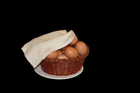 Basket with eggs Stock Photos