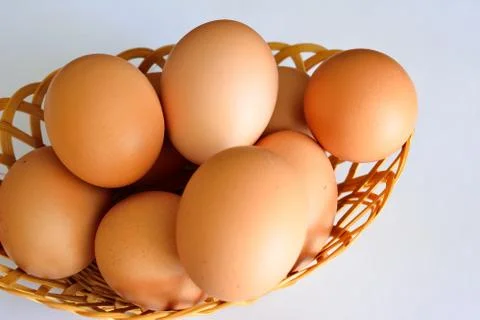 Basket of eggs Stock Photos