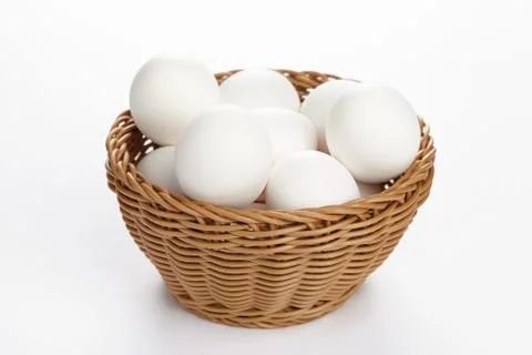 Basket of eggs Stock Photos