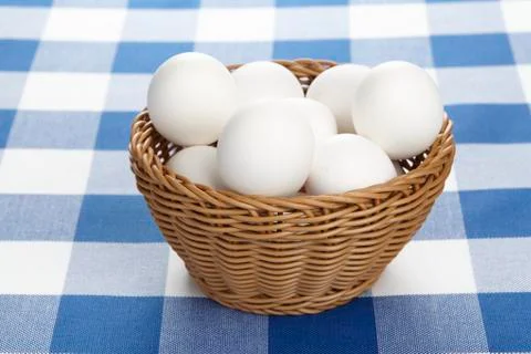 Basket of eggs Stock Photos