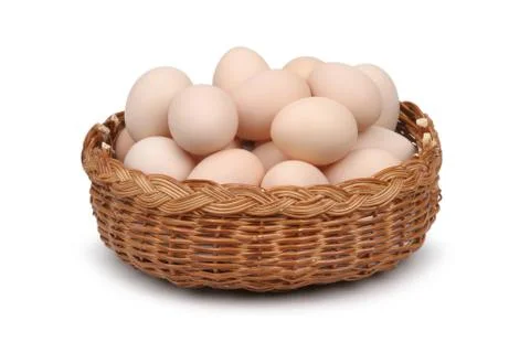 Basket of eggs on white background Stock Photos
