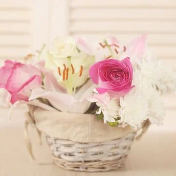 Basket of flowers Stock Photos