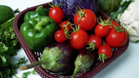 Basket of Fresh Vegetables on White Background, A basket filled with fresh .. Stock Footage 305029720