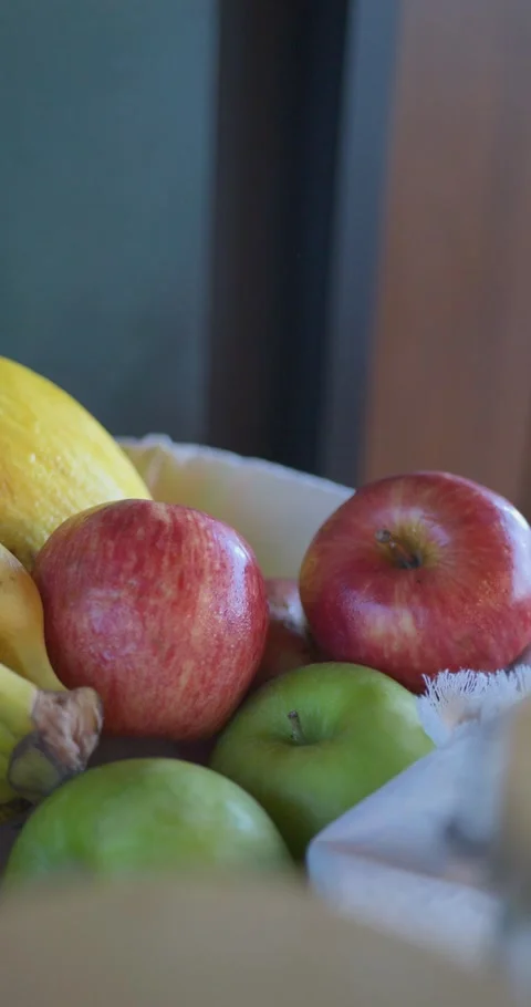 A basket of fruit including apples  bananas  and pears Stock Footage 329970124