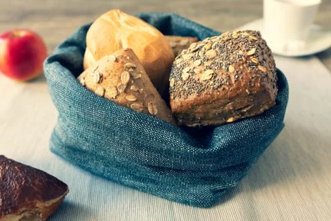 A basket full of bread rolls for breakfast Foto stock