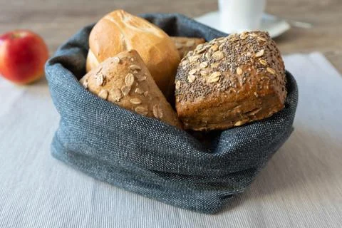 A basket full of bread rolls for breakfast Fotos Stock
