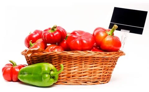 Basket full of capsicum. Stock Photos