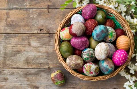 Basket full of colorful Easter eggs Stock Photos