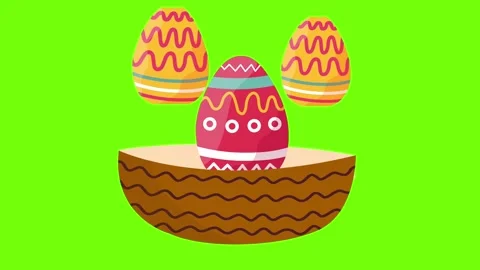 Basket full of colorful patterned easter eggs on green screen Stock Footage 329585433
