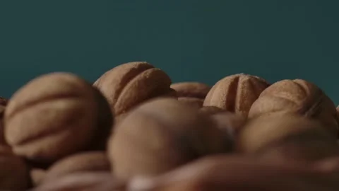 A basket full of cookies in the form of nutshell rotating extreme close up Видео 133266109