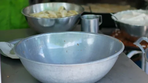 Basket full of deep fried fresh banana for Thai snack Stock Footage 138163102