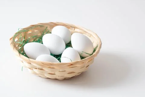 Basket full of eggs Stock Photos