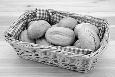 Basket full of fresh bread rolls Stock Photos