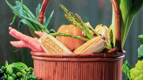 Basket full of fresh looking assorted vegetables Stock Photos