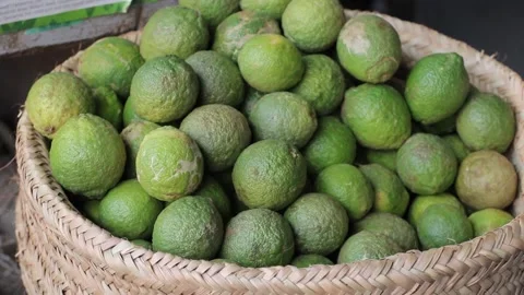 Basket of green lemons Stock Footage 162973430