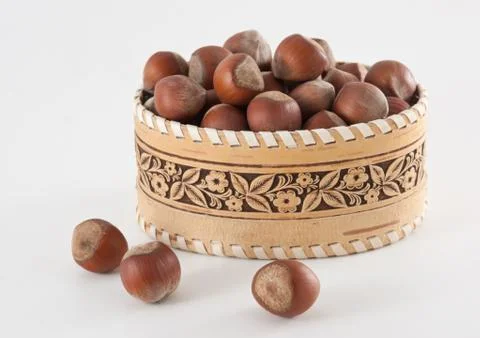 Basket with hazelnuts 스톡 사진