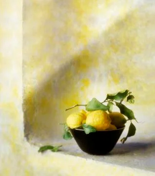Basket of lemons Stock Photos