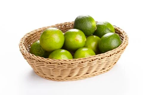 Basket of limes Stock Photos