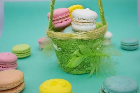 Basket of Macarons with a Pastel Backdrop Stock Photos