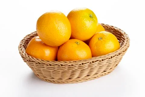 Basket of oranges Stock Photos