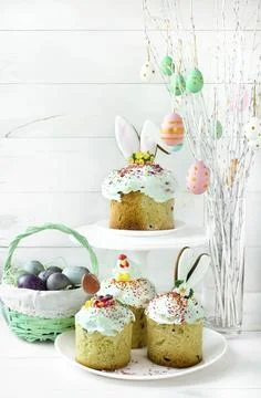 Basket with painted eggs. Easter tree with eggs Stock Photos
