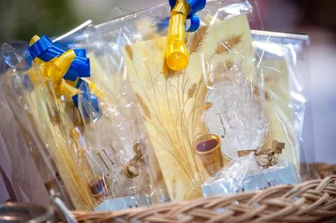Basket with parchments in memory of the day of the first communion Stock Photos