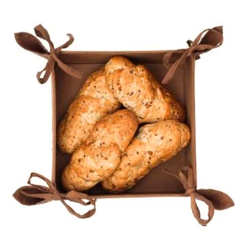 Basket with pastry on a white background Stock Photos