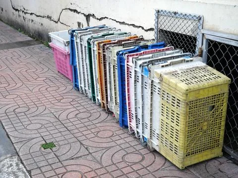 Basket for putting fruit in old condition. They are lined up on the sidewal.. Stock Photos