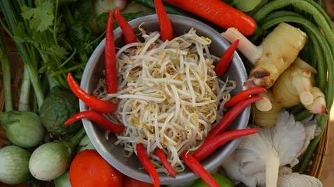 A basket with some fresh vegetables on the table. Close-up. 4k Stock Footage 106224454
