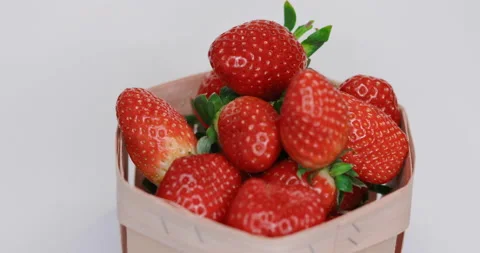 Basket with strawberries rotates Stock Footage 124660467