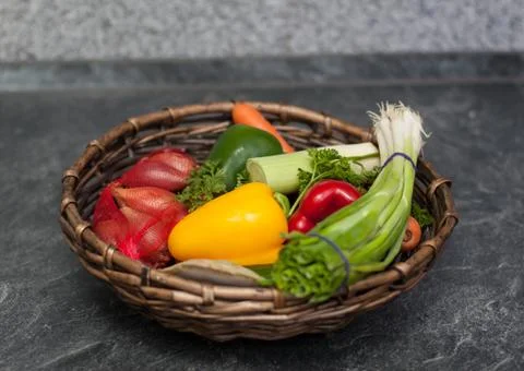 Basket with vegetables Stock Photos