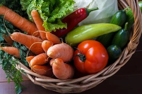 Basket with vegetables Stock Photos