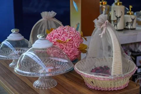 Basket with wedding gift on the table. Stock Photos
