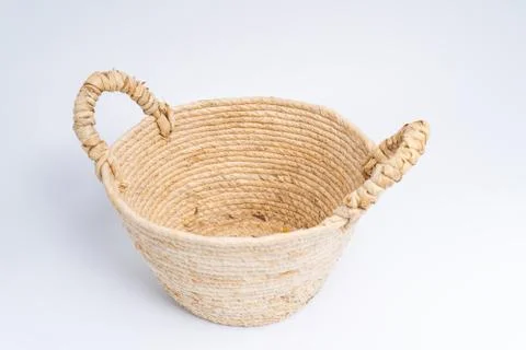 Basket wicker on isolated white background. Stock Photos