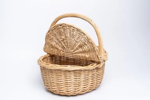 Basket wicker on isolated white background. Stock Photos