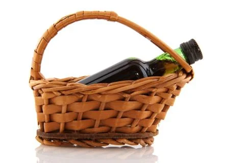 Basket with wine bottle Stock Photos