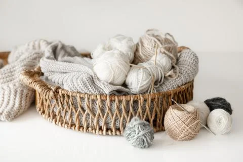 Basket with yarn close-up, threads for knitting. Stock Photos